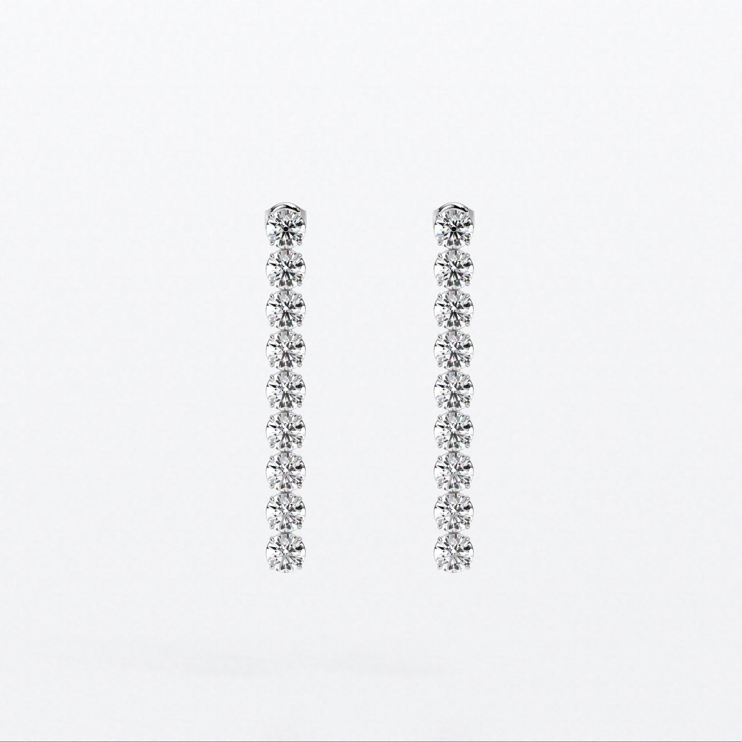Pendientes rivière largos de oro blanco con diamantes