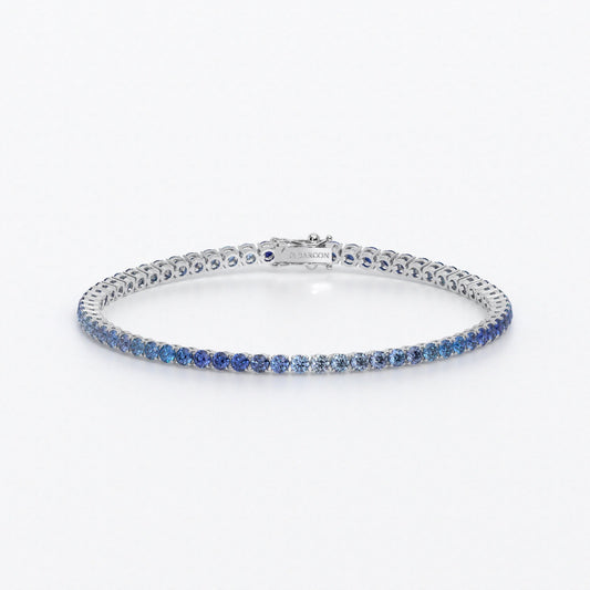 Rivière de oro de 18k con zafiros azules en degradé en talla brillante