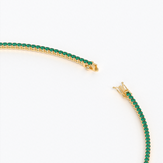 Collar rivière de oro de 18K con esmeraldas en talla brillante