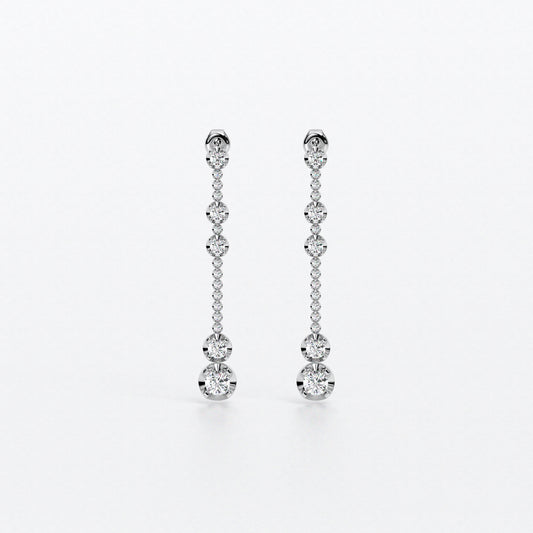 Pendientes largos en oro blanco con diamantes en línea