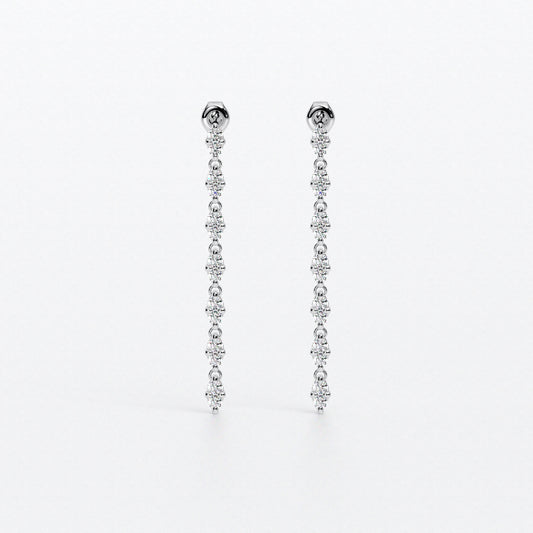 Pendientes articulados tipo rivière en oro blanco con diamantes talla brillante
