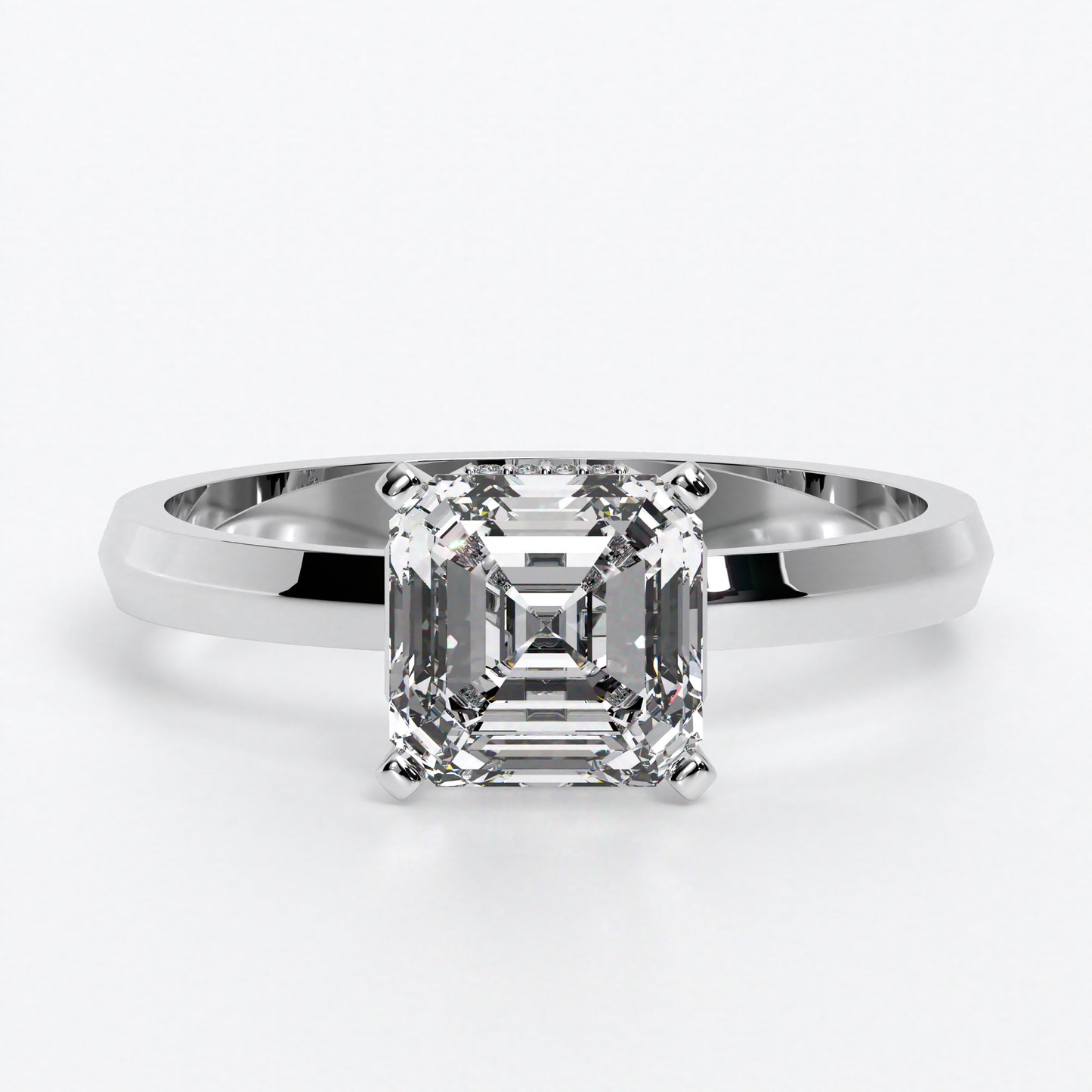 Anillo de oro de 18 quilates con un diamante central en talla Ascher