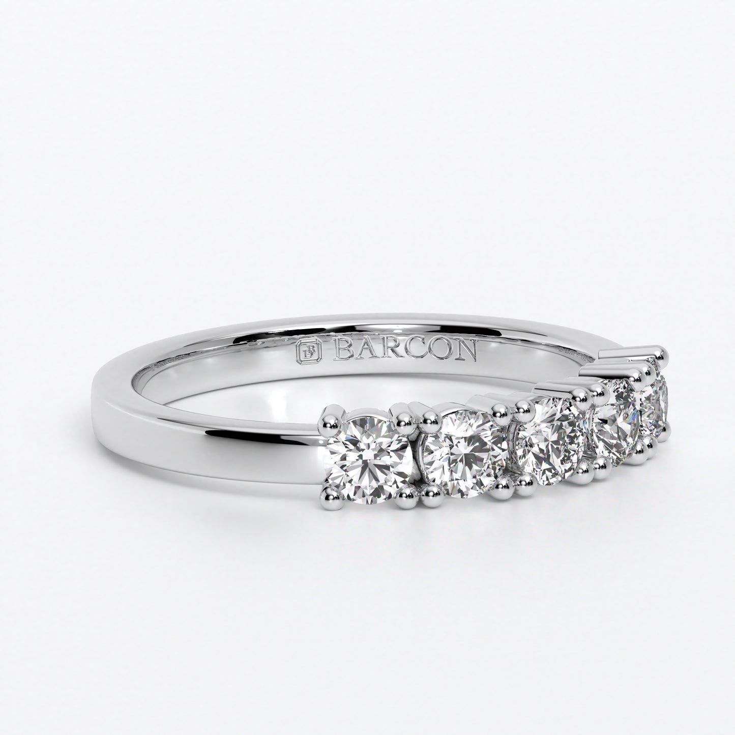 Anillo cinquillo con diamantes en oro de 18 quilates