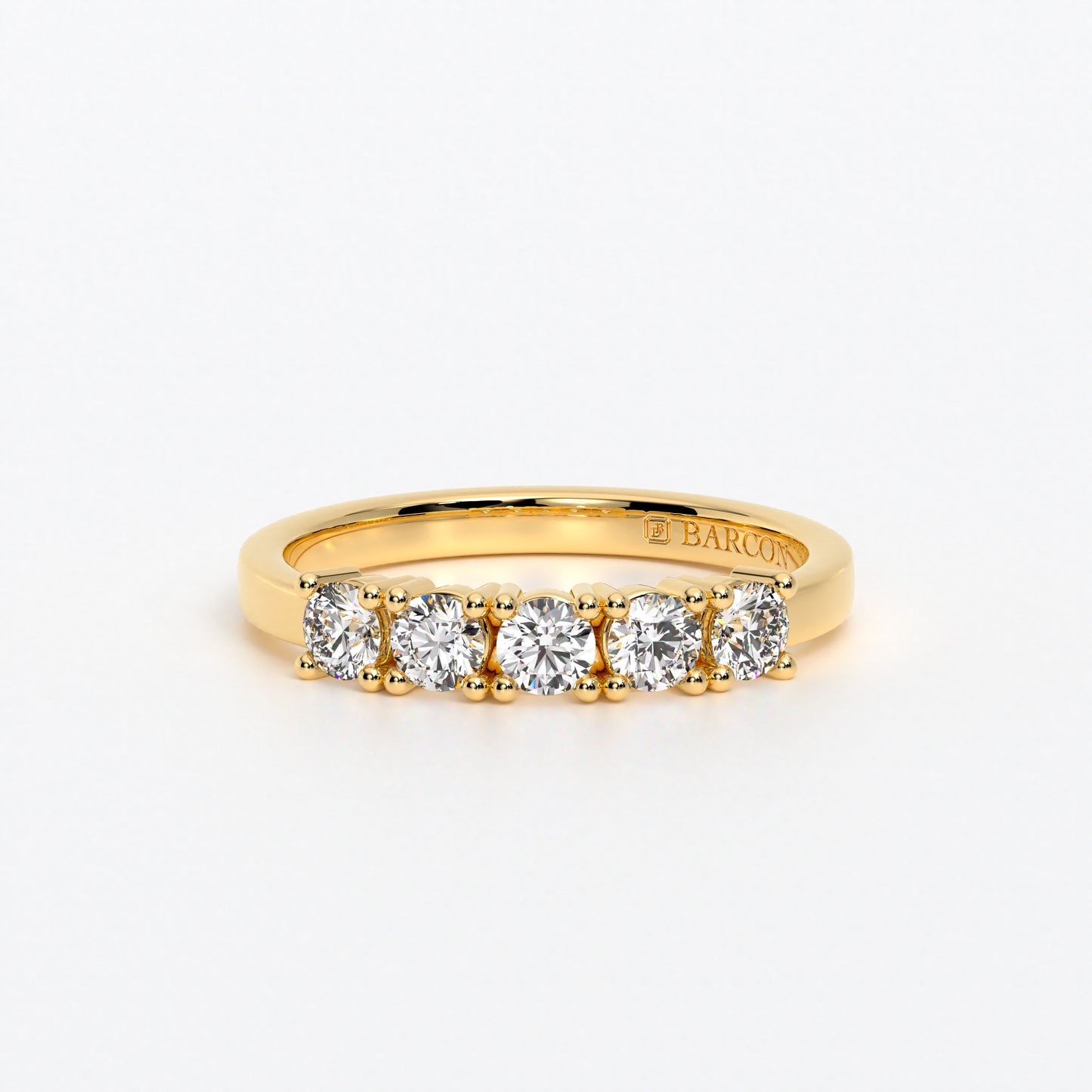 Anillo cinquillo con diamantes en oro de 18 quilates