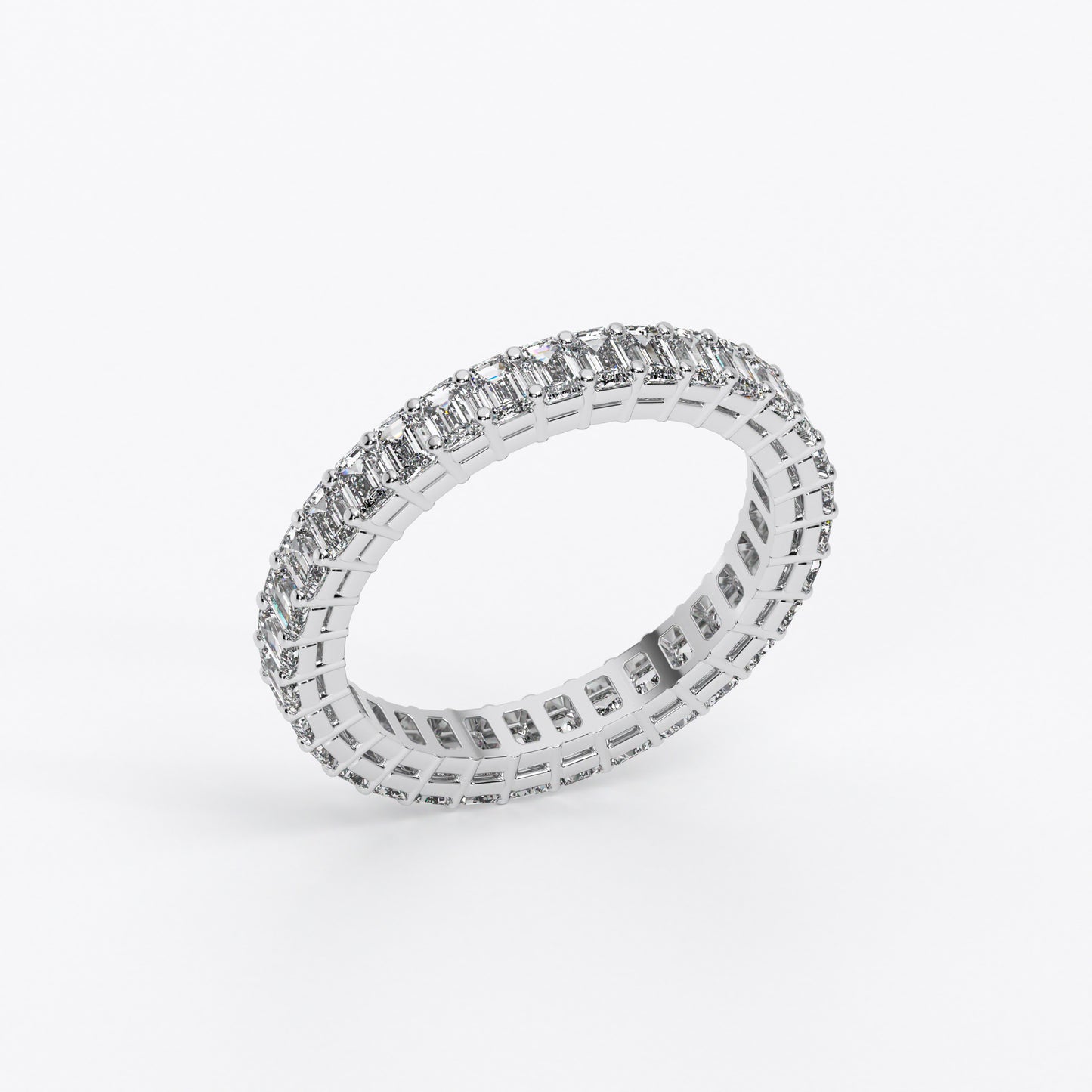 Anillo Alianza con diamantes talla esmeralda