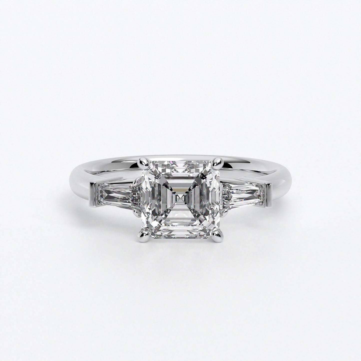 Anillo de oro blanco de 18K con diamante central en talla Asscher, 2 diamantes en talla Trapecio