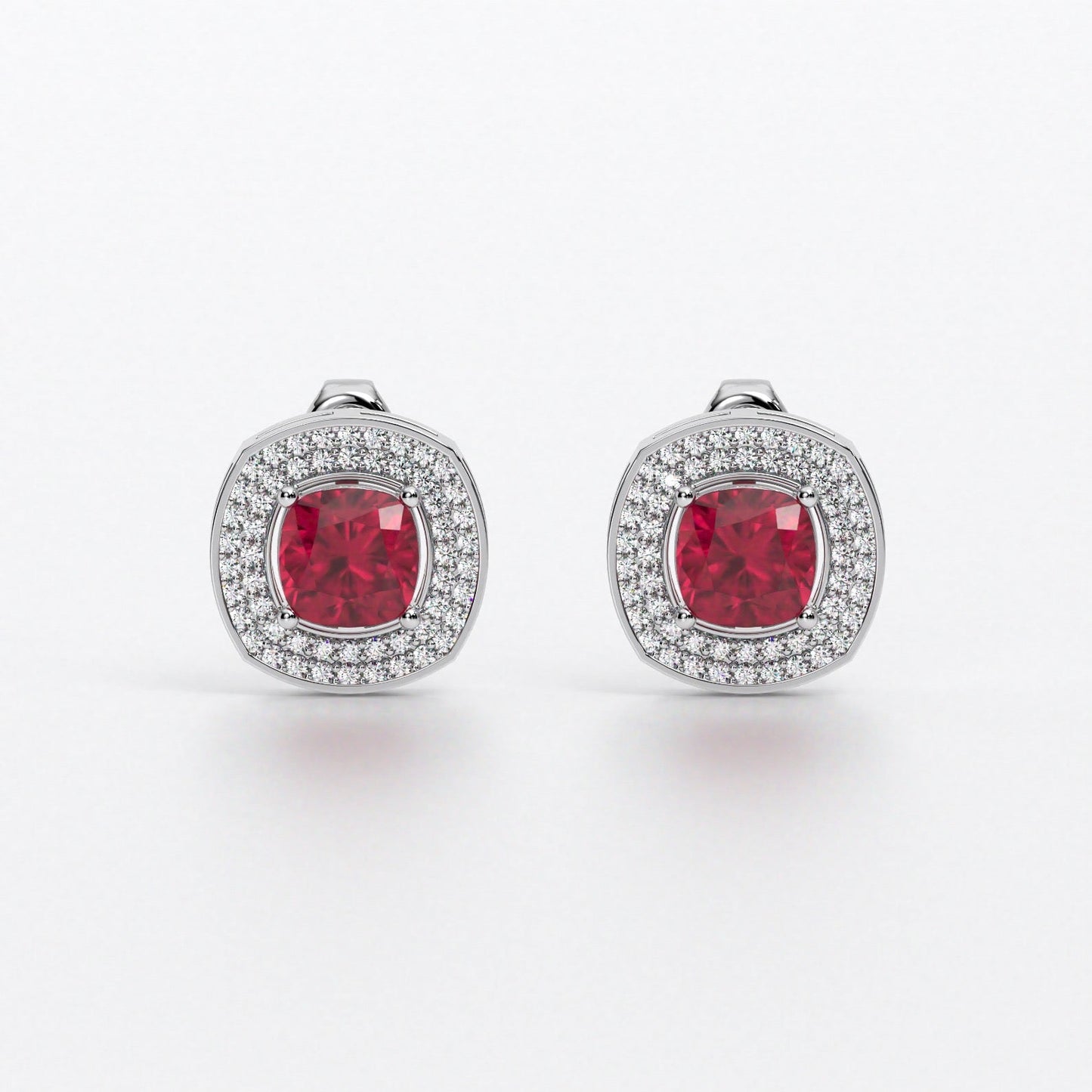 Pendientes de oro de 18K con rubí talla cushion y halo de diamantes