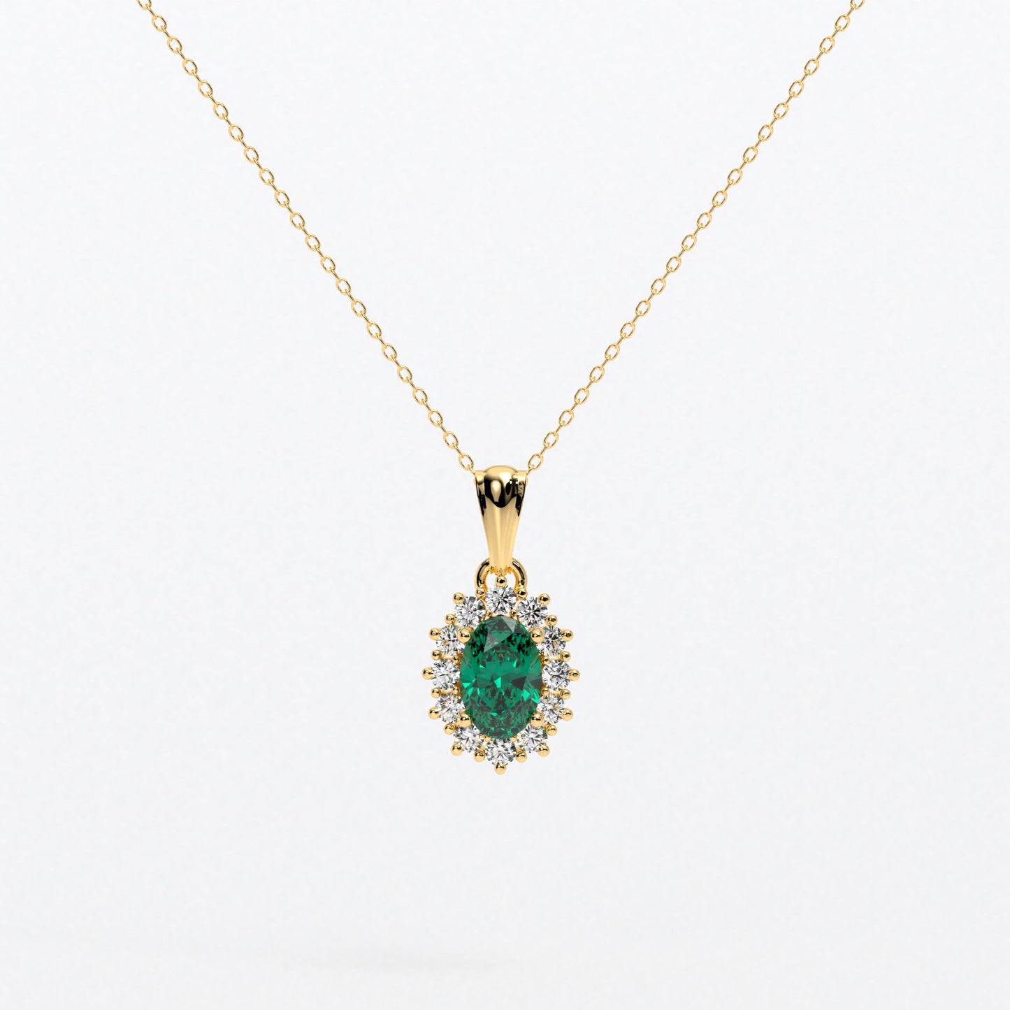 Colgante rosetón con esmeralda natural y brillantes en oro de 18K