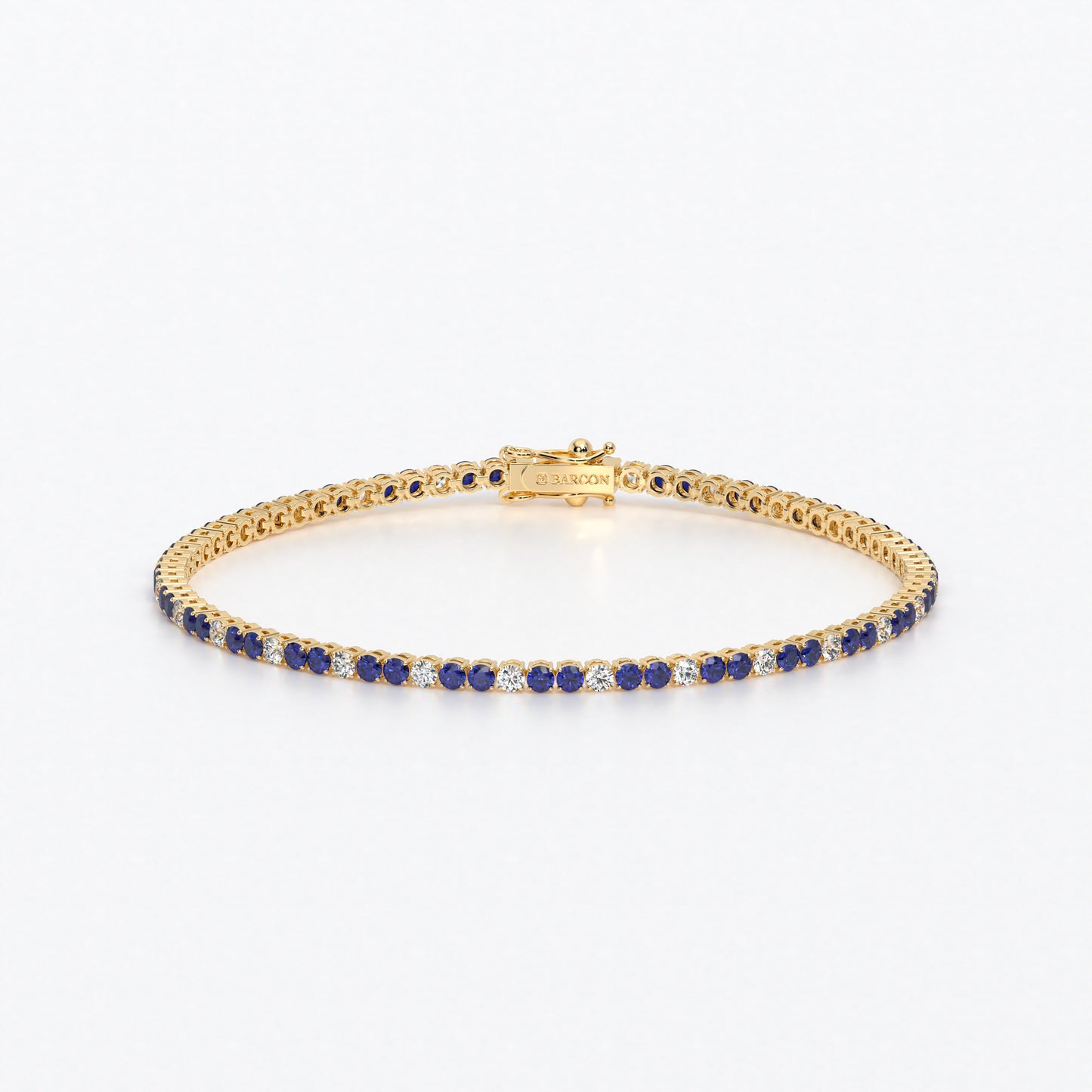 Rivière de oro de 18k con diamantes blancos y zafiros azules en talla brillante