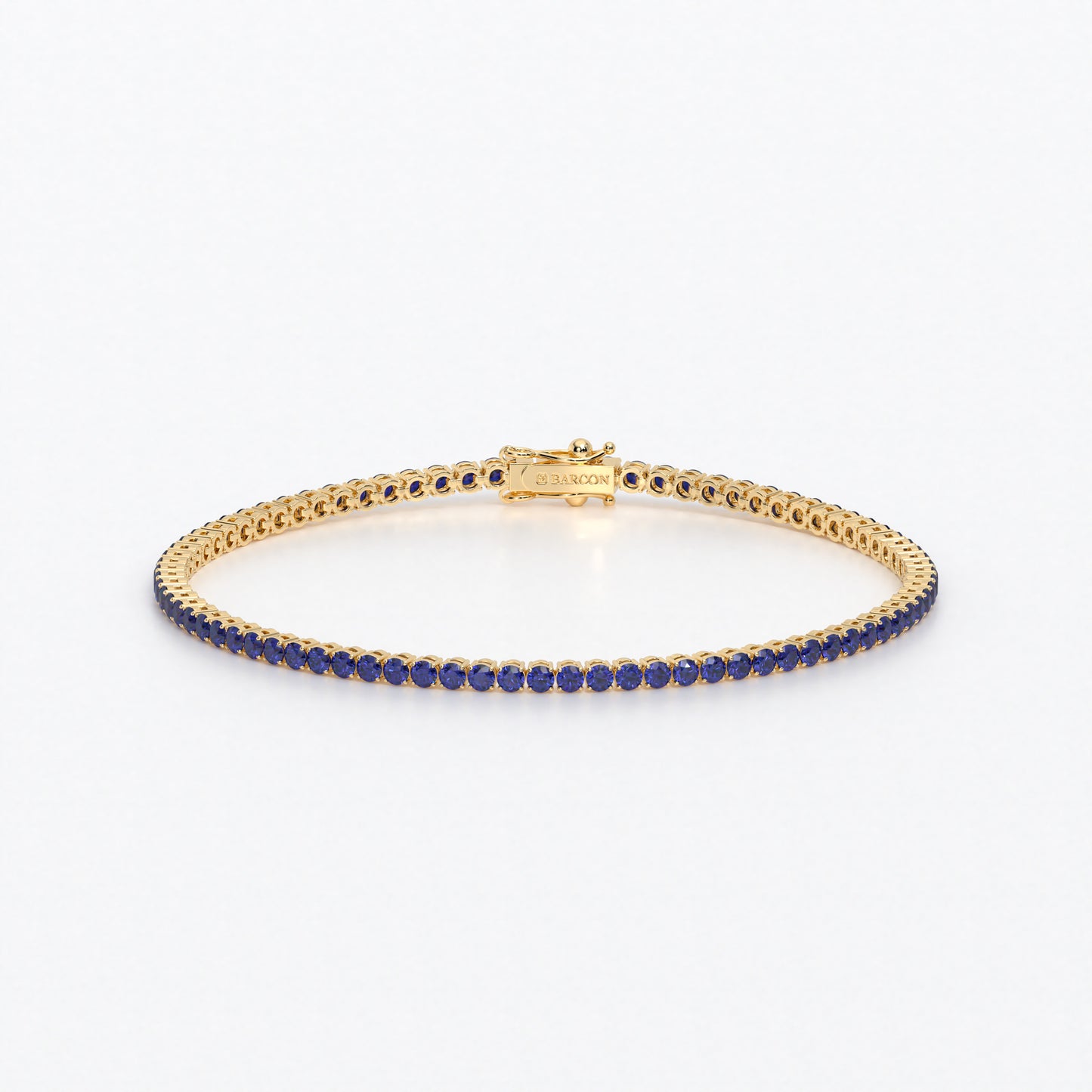 Rivière de oro de 18k con zafiros azules en talla brillante