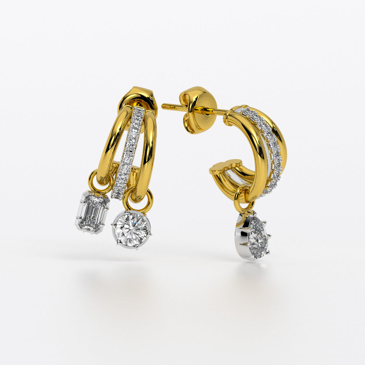 Pendientes de oro amarillo de 18K con triple aro y diamantes colgantes de distintas tallas
