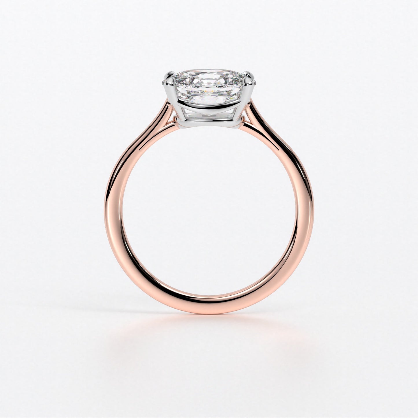 Anillo de oro rosa de 18K con diamante central talla cushion