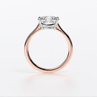 Anillo de oro rosa de 18K con diamante central talla cushion
