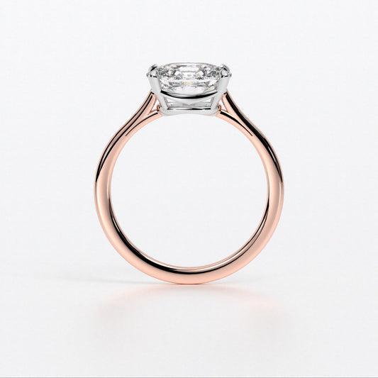 Anillo de oro rosa de 18K con diamante central talla cushion