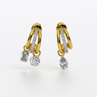 Pendientes de oro amarillo de 18K con triple aro y diamantes colgantes de distintas tallas