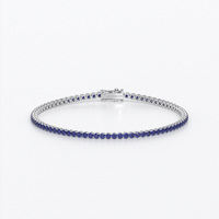Rivière de oro de 18k con zafiros azules en talla brillante