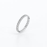 Alianza infinity de oro de 18K con diamantes blancos
