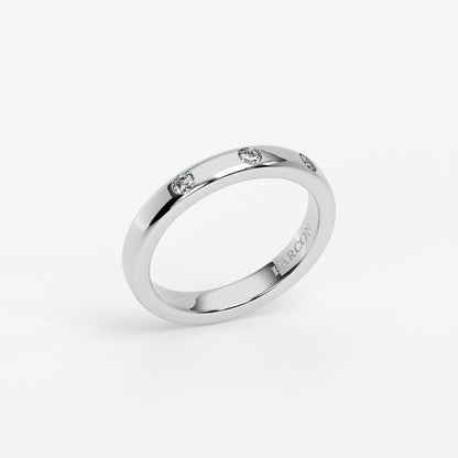 Alianza de oro blanco con tres diamantes