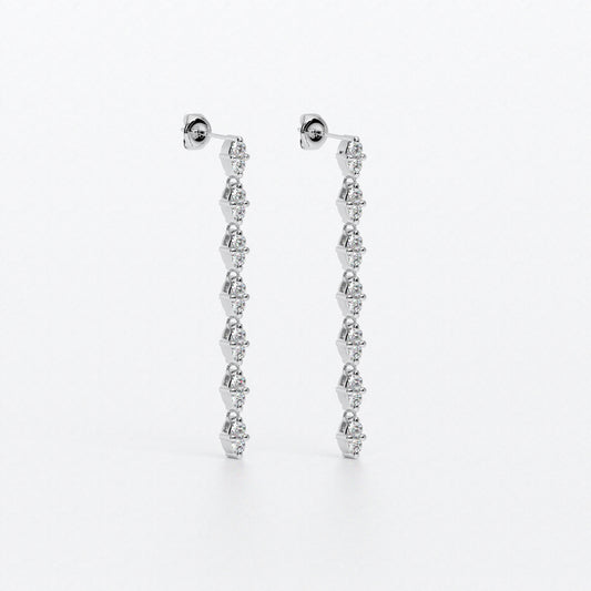 Pendientes articulados tipo rivière en oro blanco con diamantes talla brillante