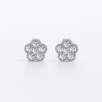 Pendientes con forma de flor con diamantes talla brillante