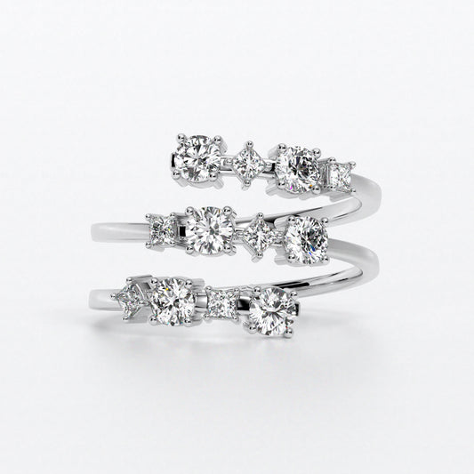 Anillo con diamantes talla brillante y princesa en tres líneas