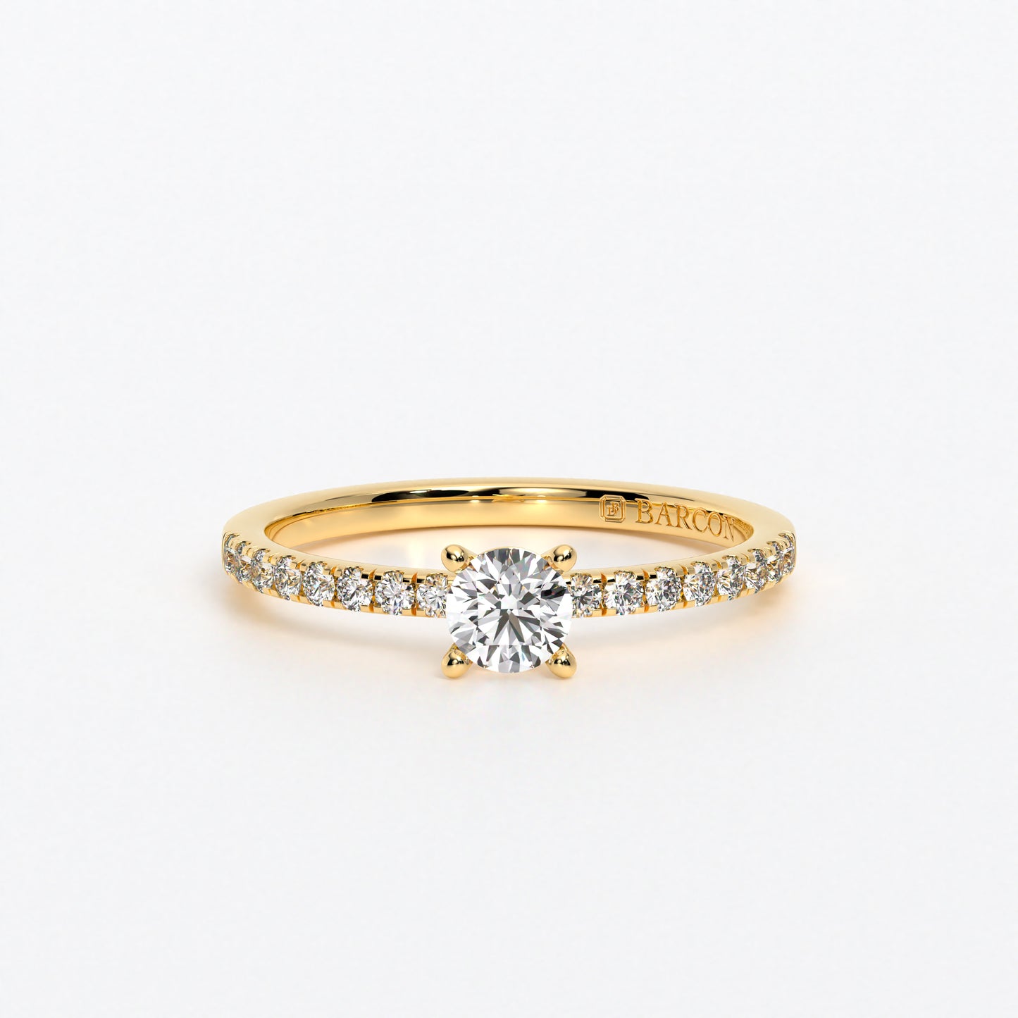 Solitario de oro de 18 K,  con diamante central, con 16 diamantes laterales