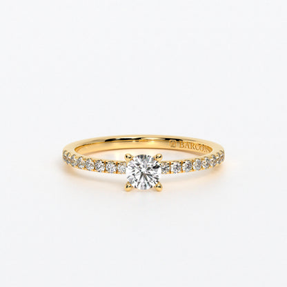 Solitario de oro de 18 K,  con diamante central, con 16 diamantes laterales