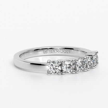 Anillo cinquillo con diamantes en oro de 18 quilates
