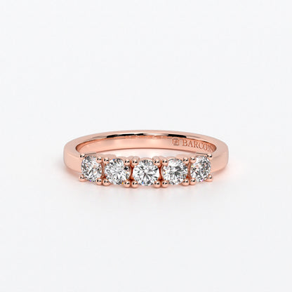 Anillo cinquillo con diamantes en oro de 18 quilates