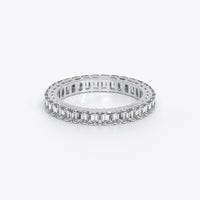 Anillo Alianza con diamantes talla esmeralda