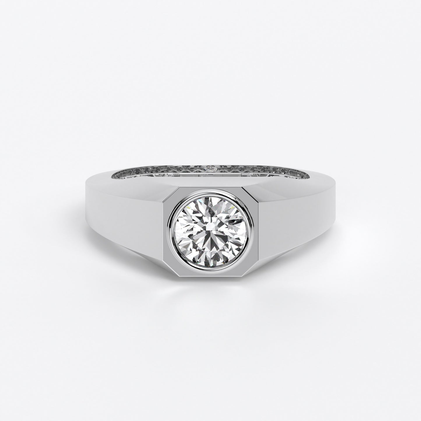 Anillo de oro blanco de 18K con diamante central talla brillante engastado en bisel