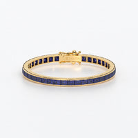 Rivière de oro de 18k con zafiros azules en talla princesa