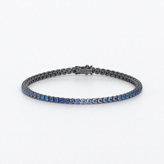 Rivière de oro de 18k con zafiros azules en degradé en talla brillante