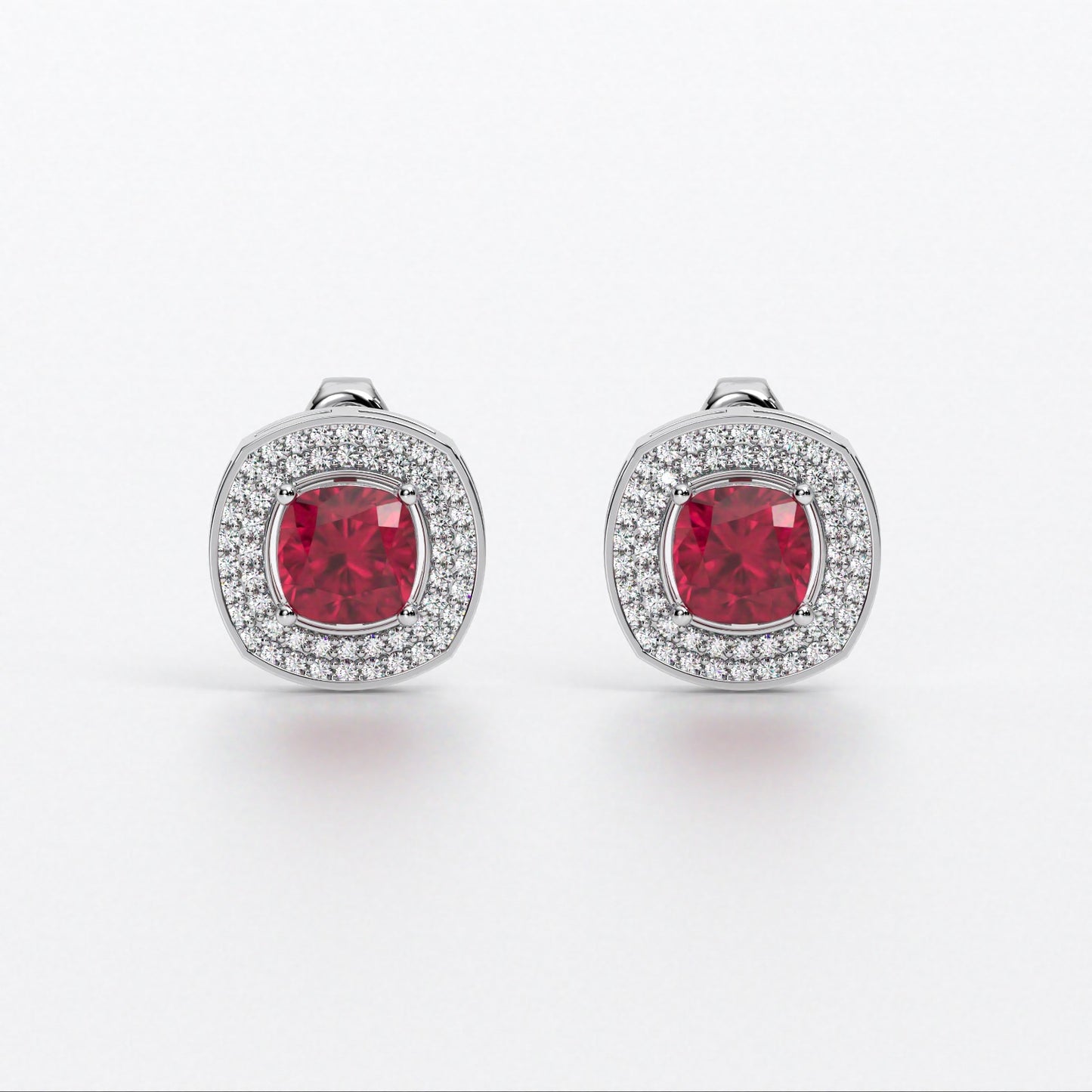 Pendientes de oro de 18K con rubí talla cushion y halo de diamantes