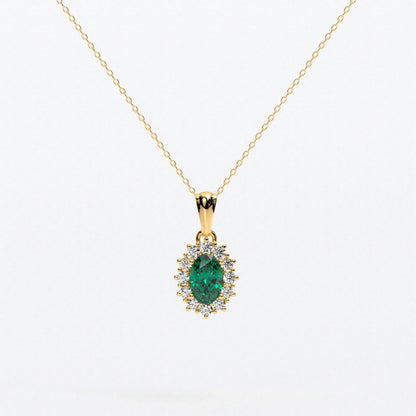 Colgante rosetón con esmeralda natural y brillantes en oro de 18K