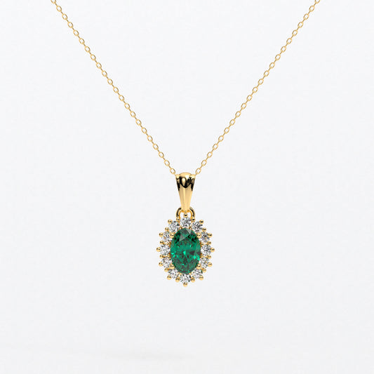 Colgante rosetón con esmeralda natural y brillantes en oro de 18K