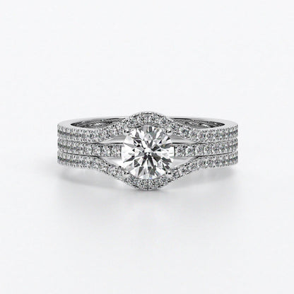 Anillo de oro blanco con diamante central talla brillante y triple pavé