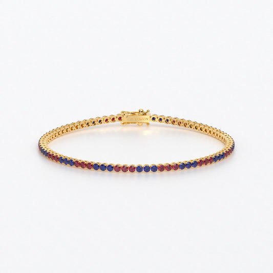 Rivière de oro de 18k con rubíes y zafiros azules en talla brillante
