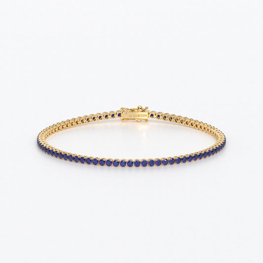 Rivière de oro de 18k con zafiros azules en talla brillante