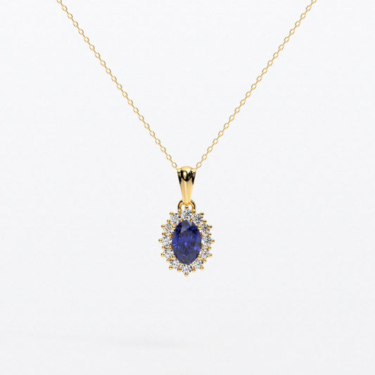 Colgante rosetón con zafiro azul natural y brillantes en oro de 18K